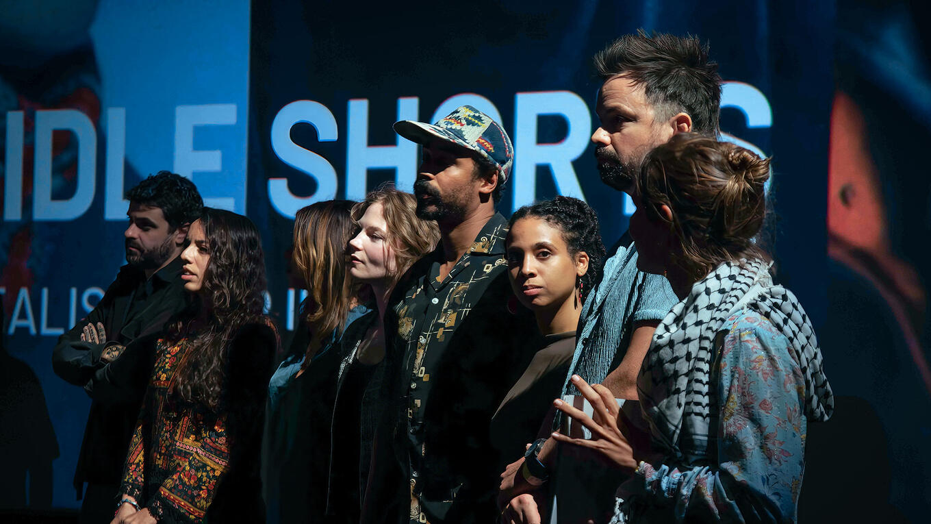 Cast and crew joining on stage for the Q&A after the Marseille premiere of Six Idle Shorts.