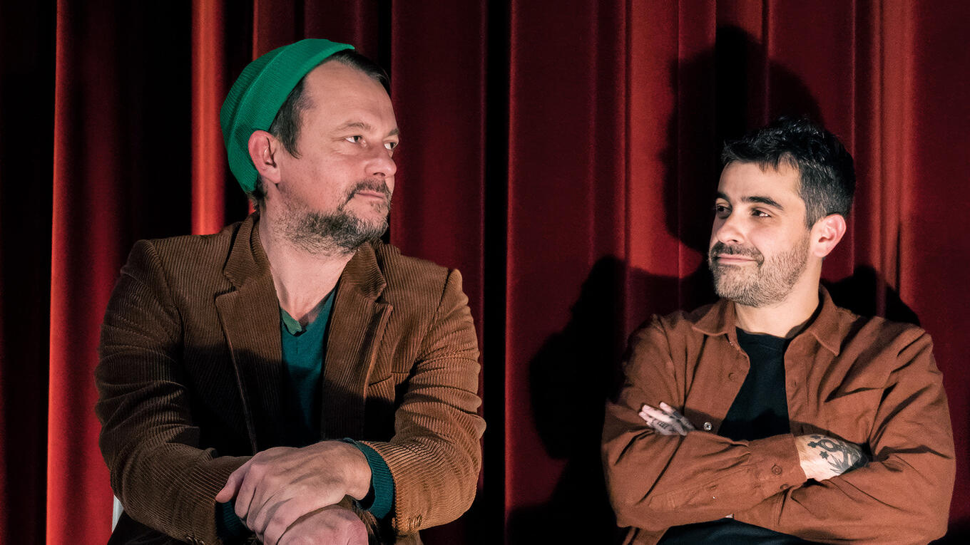 Holger Jaquet and Fernando Silvestrin in conversation at Idle Films premiere, sharing insights on the making of All Things Burn.